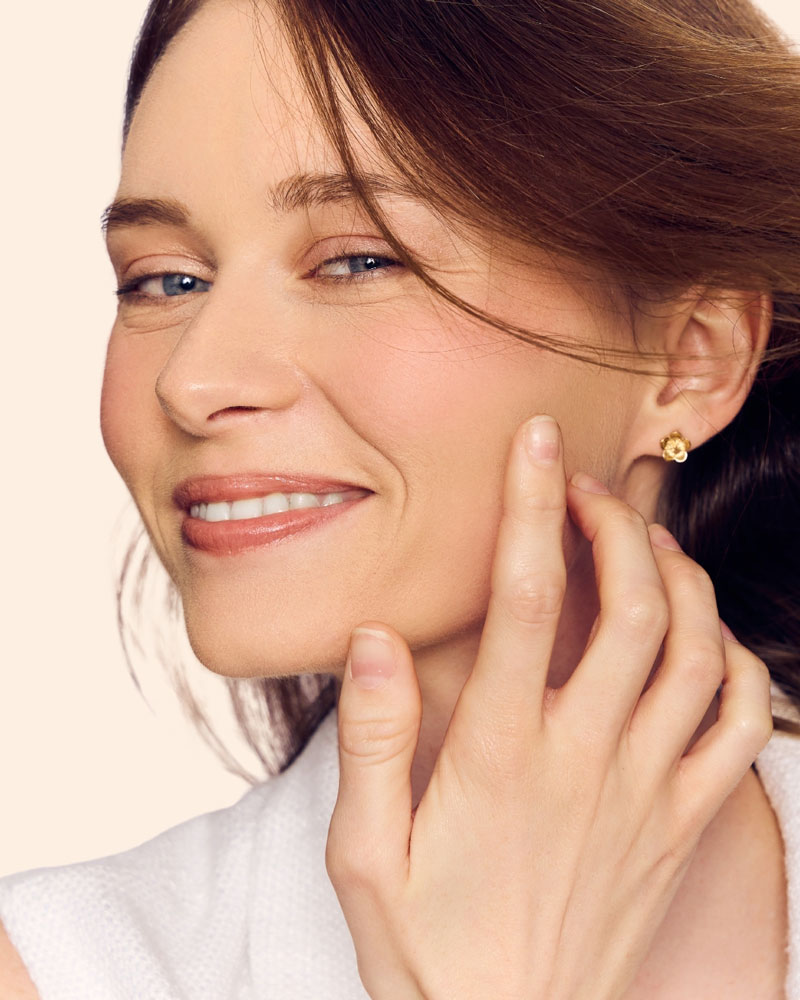 woman with glowing skin after treatment from a medical spa in Arlington, VA